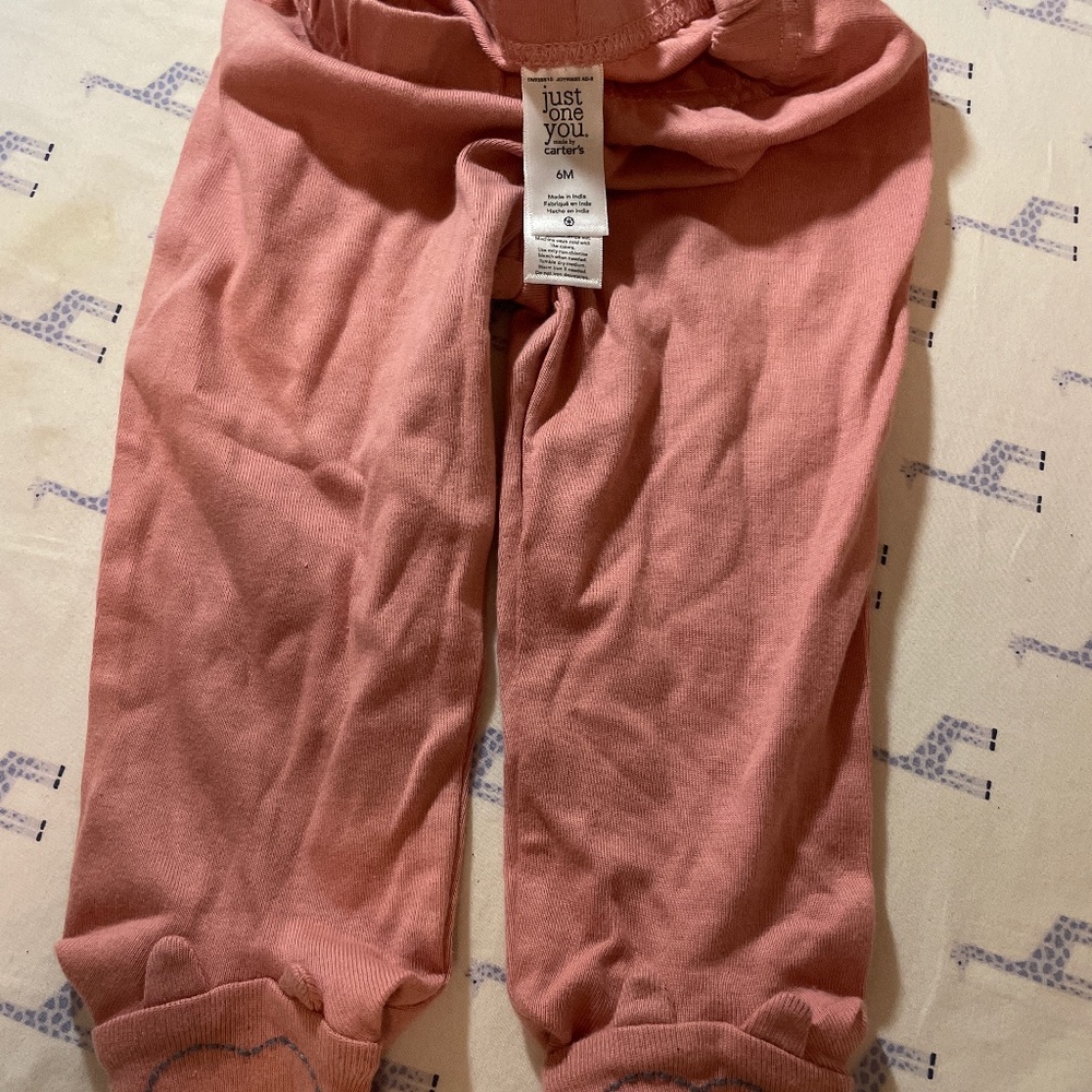 Pink baby pants with embroidered bear feet with ears